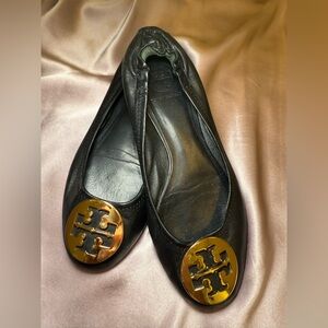 Tory Burch Black Flats with Gold Emblem